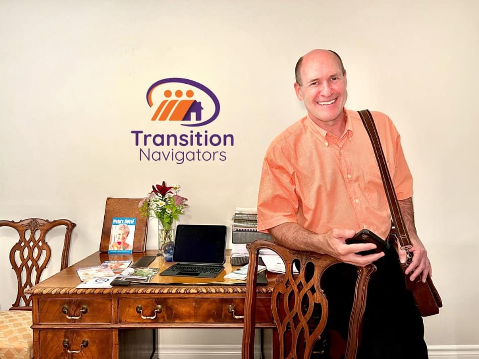 Dave standing in front of desk