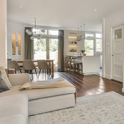 A nicely designed living room, with a modern, calm, feel in neutral colours