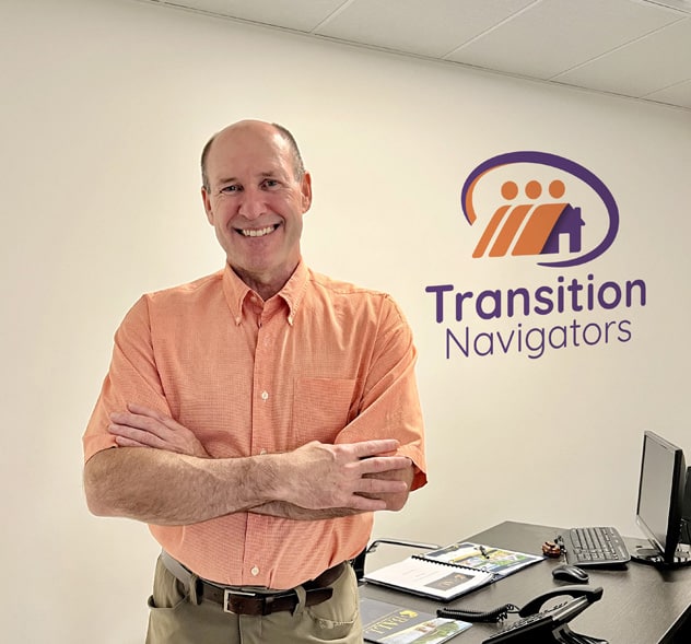 Dave standing in front of desk